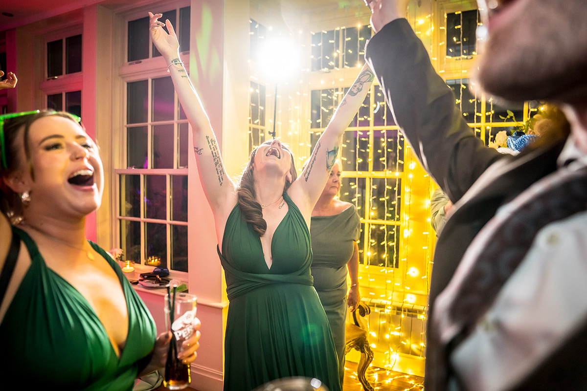 People celebrating joyfully at a festive event.