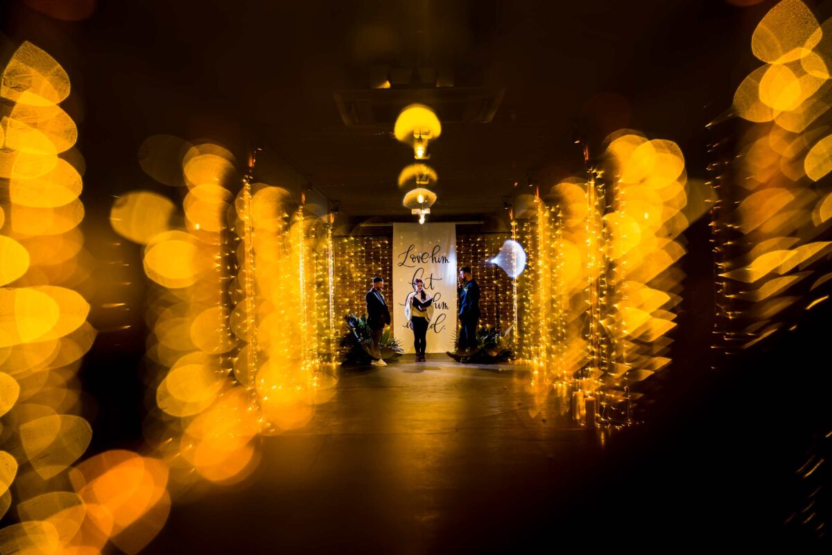 Romantic wedding ceremony with fairy lights.