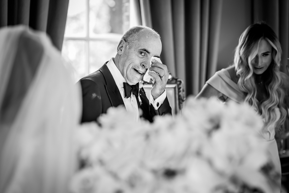 Emotional wedding moment with father and daughter