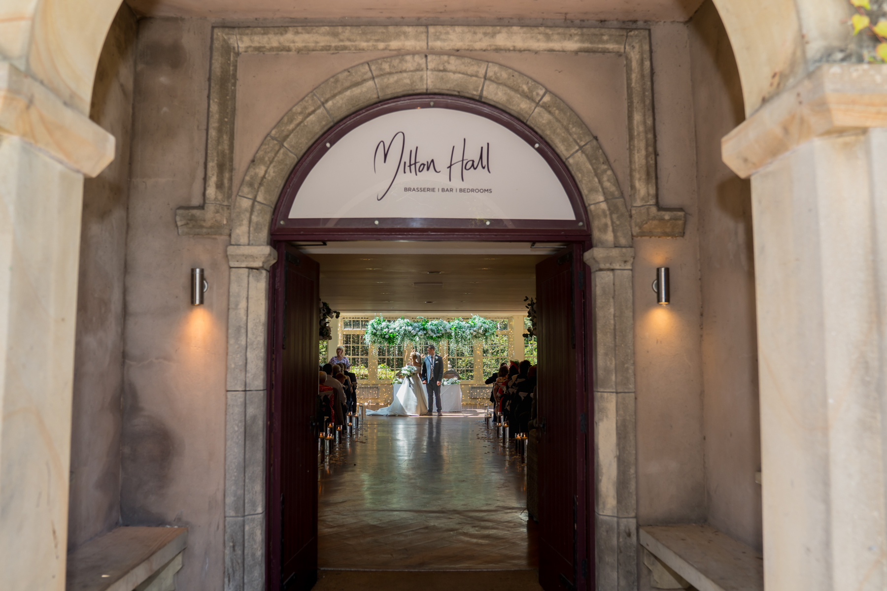 Wedding ceremony inside Mitton Hall venue