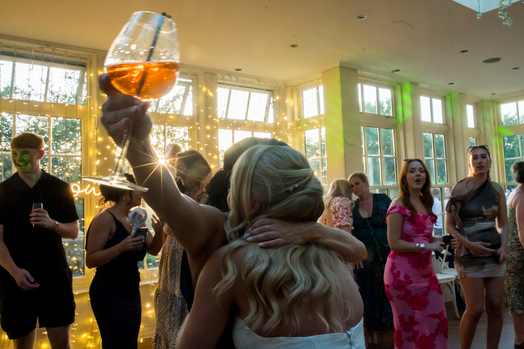 People celebrating at a festive indoor party.