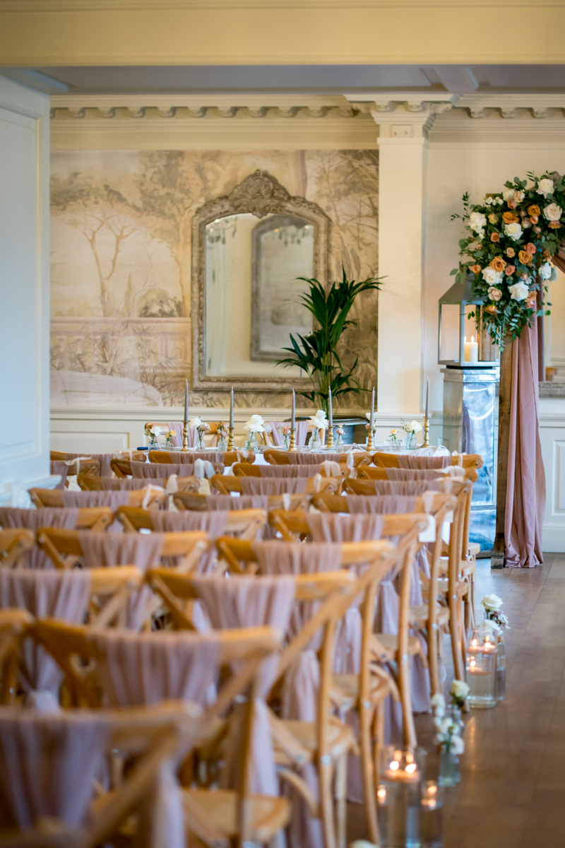 Elegant wedding ceremony venue with floral decorations