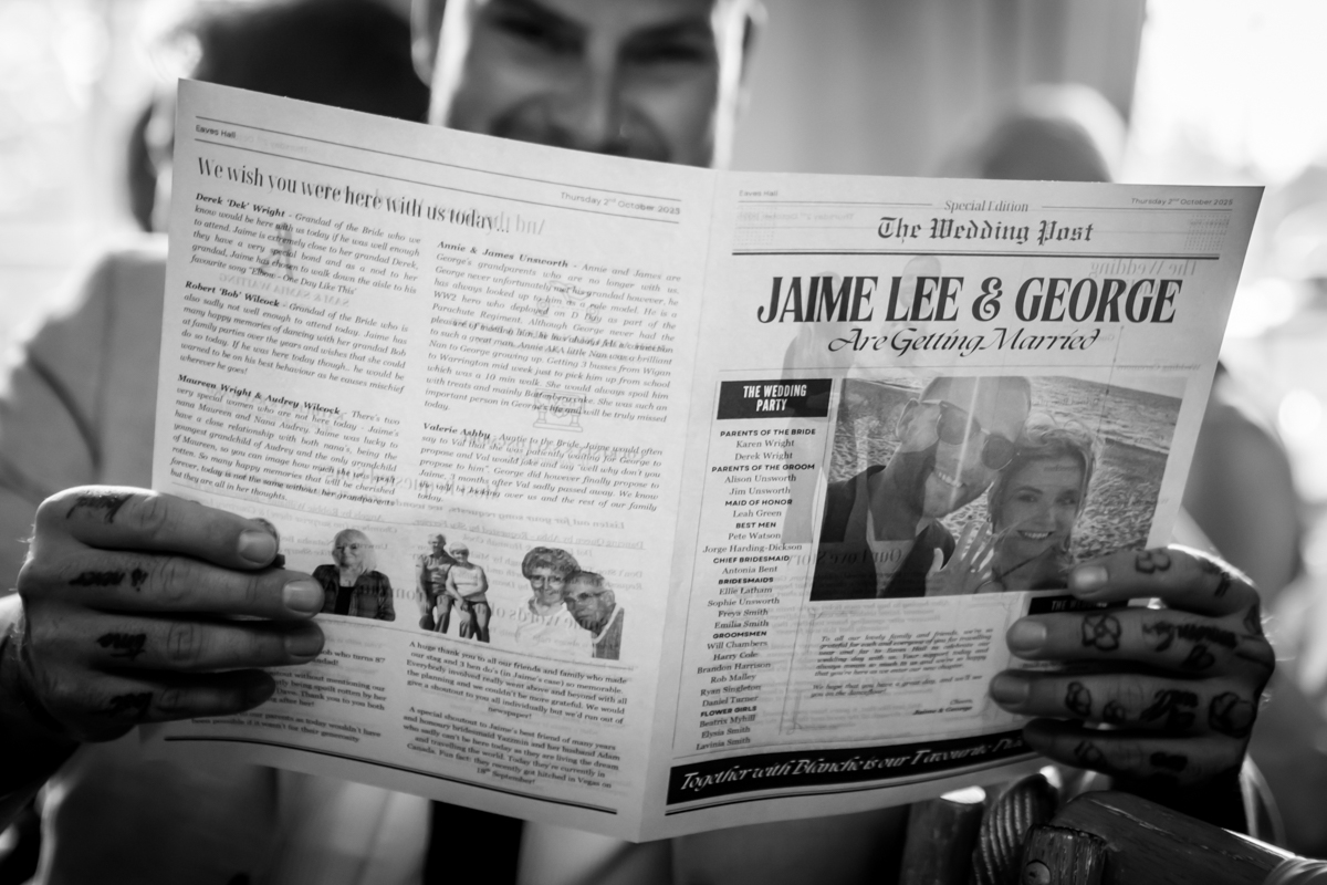Person reading a wedding announcement newspaper.
