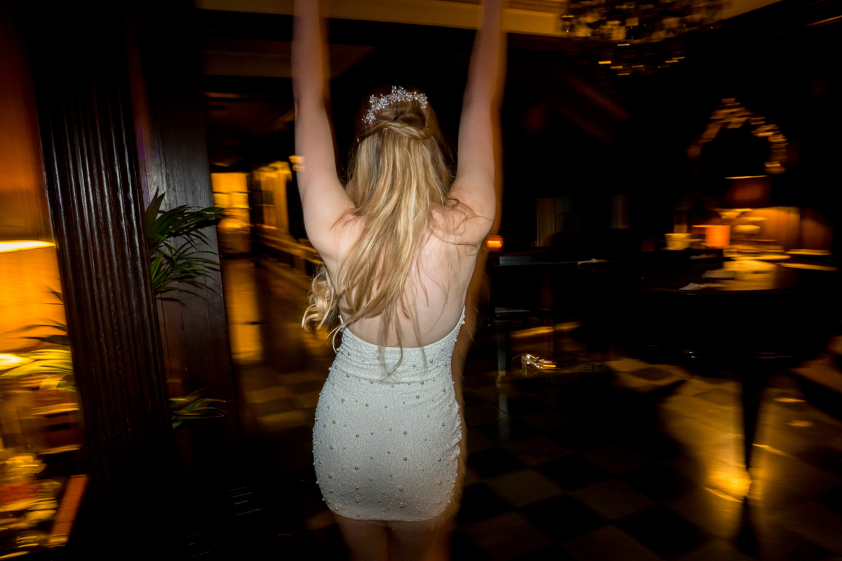 Woman dancing in a dimly lit room