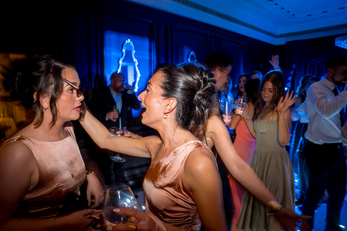 People socialising at a lively party event