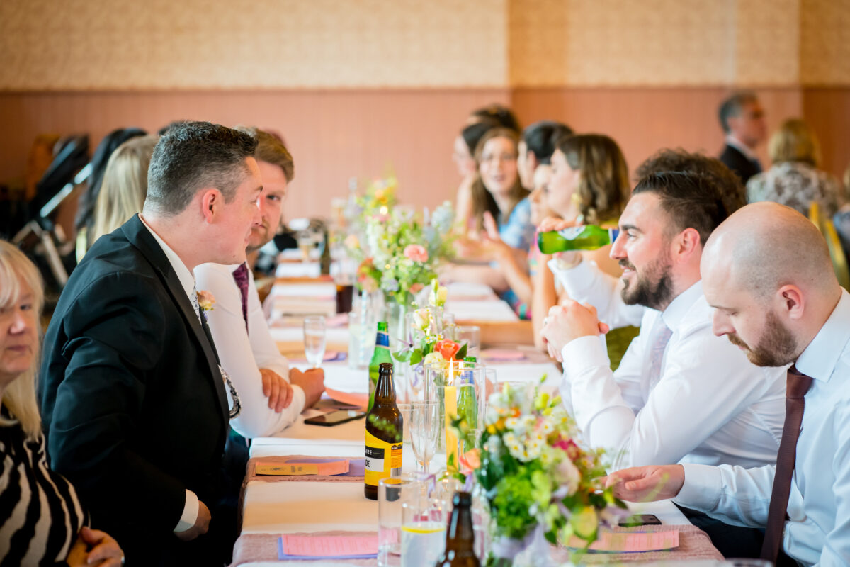 Guests chatting at a wedding reception