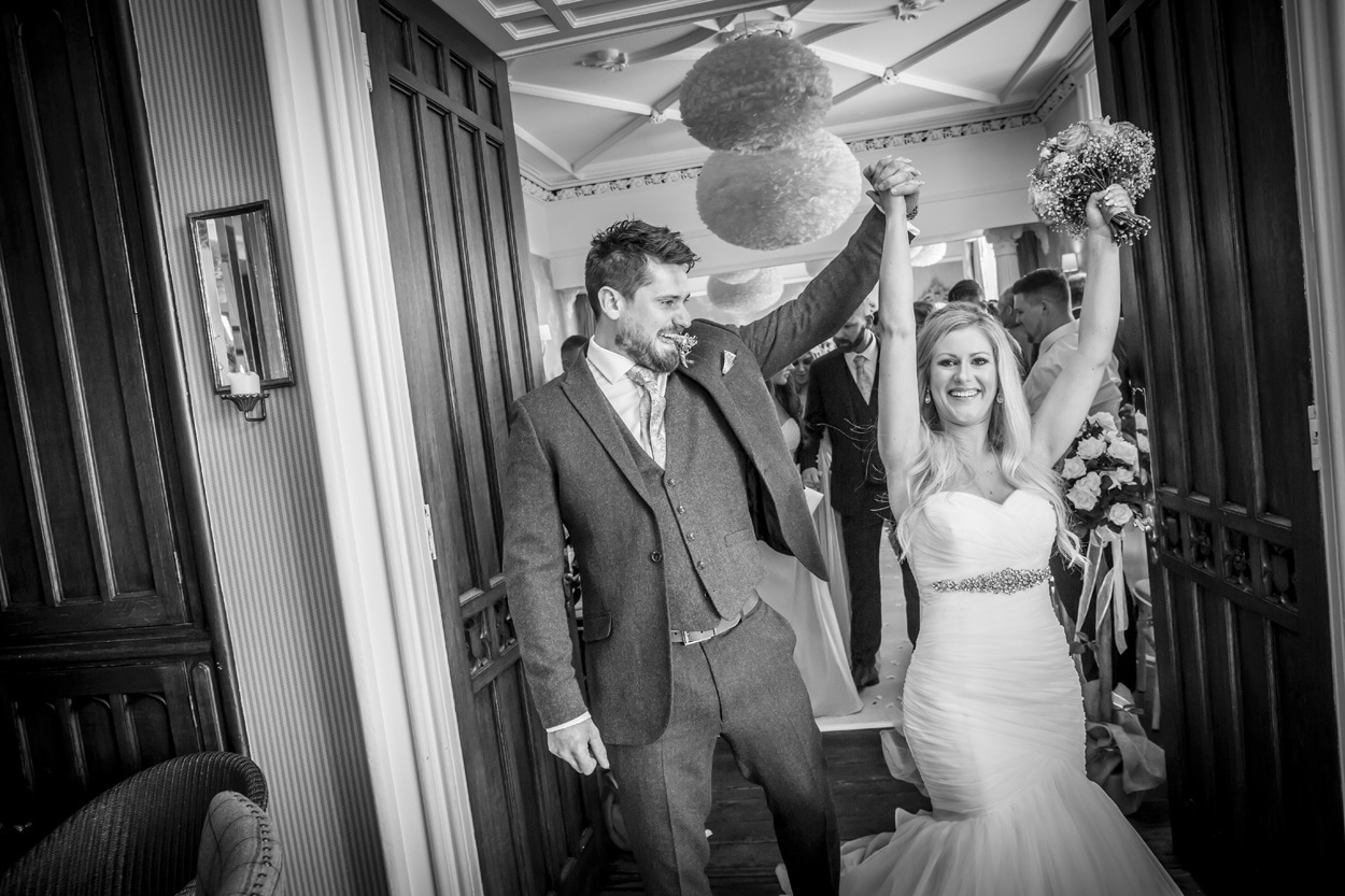 Bride and groom celebrating at wedding