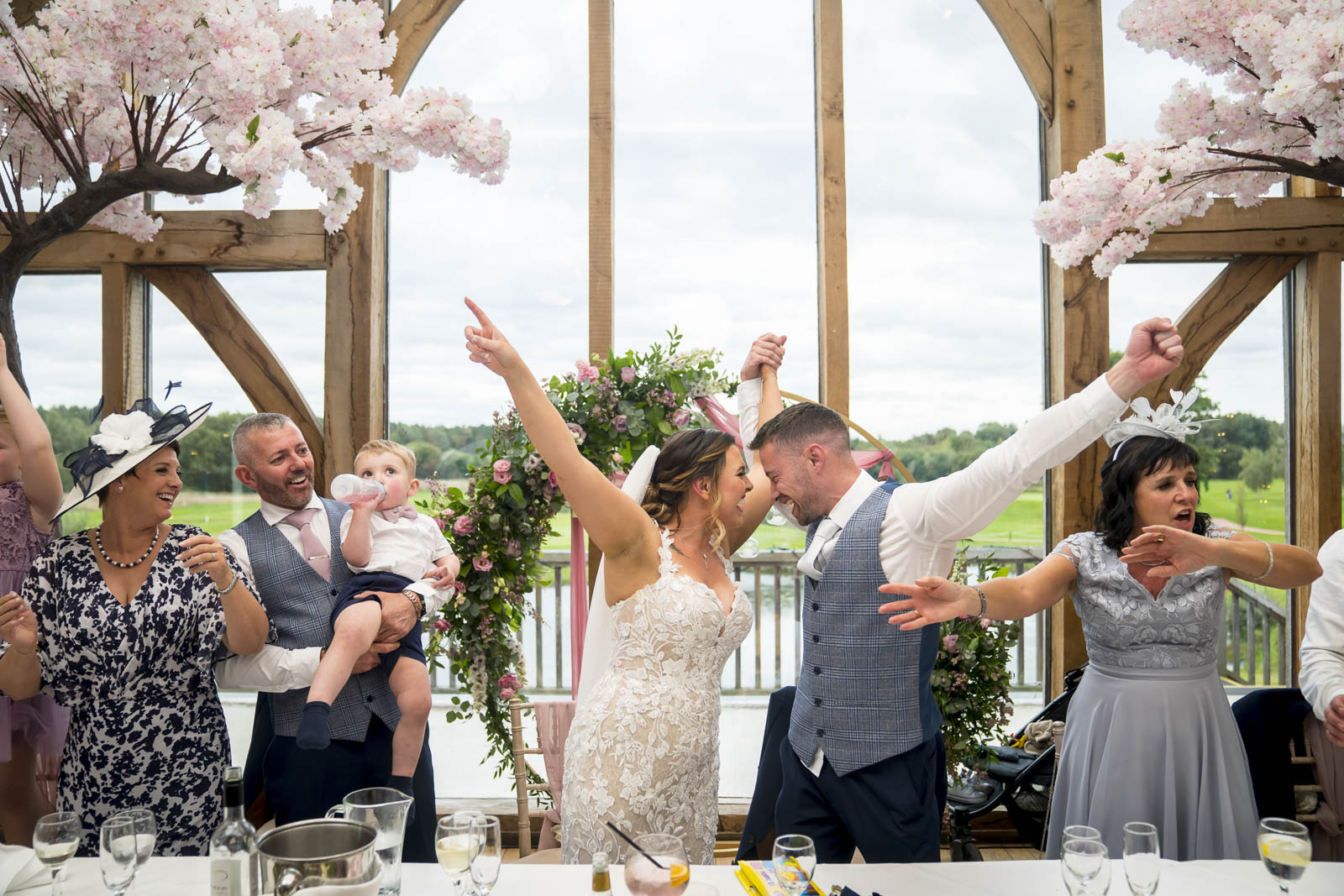 Joyful wedding celebration with family and friends.