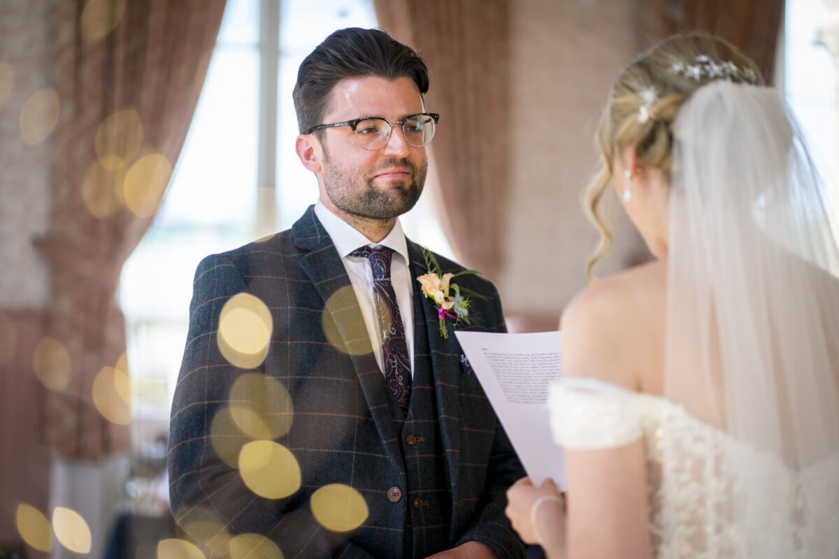 Bride and groom exchanging vows.