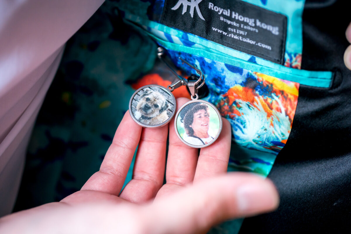 Photo charms of dog and person inside jacket