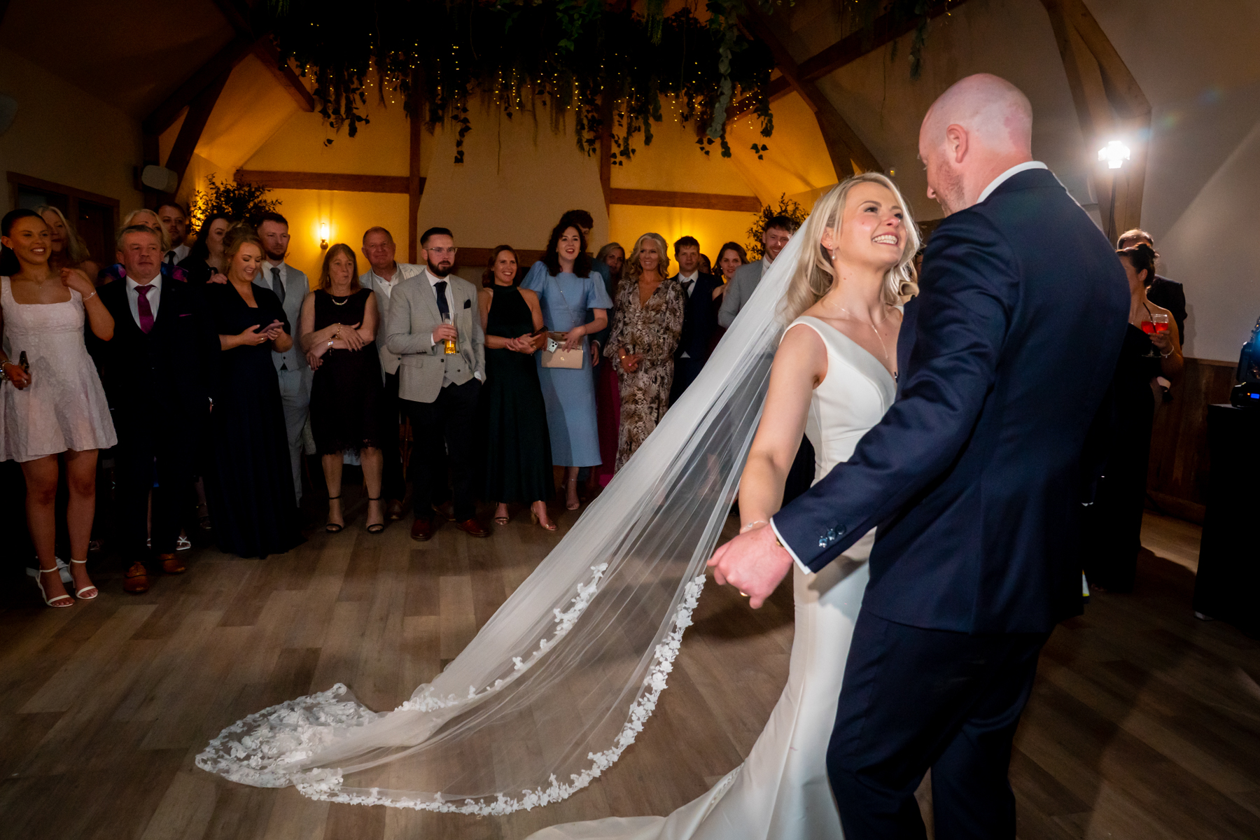Bride and groom dancing at wedding reception
